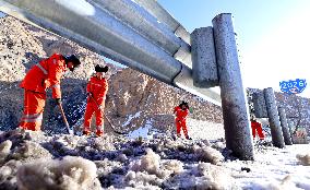 Clearing Snow on National Highway 307 in Zhangye