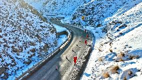 Clearing Snow on National Highway 307 in Zhangye