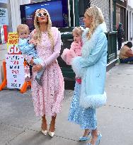 Paris And Nicky Hilton With Their Children At Museum Of Ice Cream - NYC