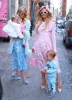 Paris And Nicky Hilton With Their Children At Museum Of Ice Cream - NYC