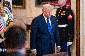 US President Donald Trump signs the Laken Riley Act