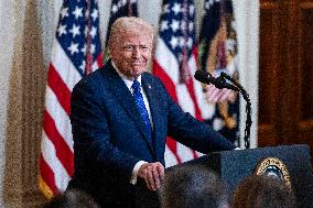 US President Donald Trump signs the Laken Riley Act