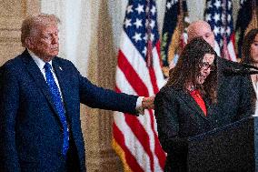 US President Donald Trump signs the Laken Riley Act