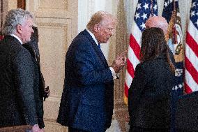 US President Donald Trump signs the Laken Riley Act