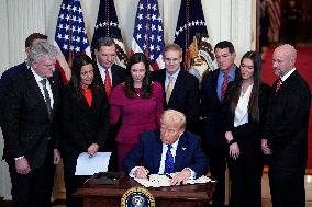 Donald Trump signs the Laken Riley Act - Washington