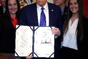 Donald Trump signs the Laken Riley Act - Washington