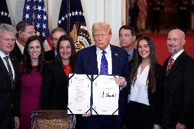 Donald Trump signs the Laken Riley Act - Washington
