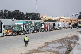 Aid Trucks Wait to Enter Gaza