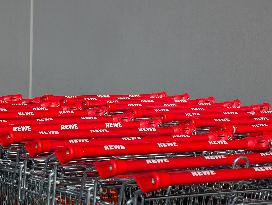 Stacked REWE Shopping Carts In Munich