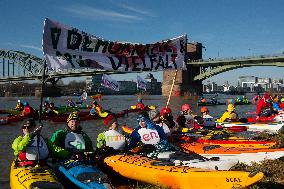 Protesters Paddle For Diversity In Cologne