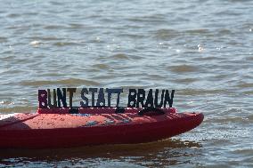 Protesters Paddle For Diversity In Cologne