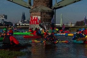 Protesters Paddle For Diversity In Cologne