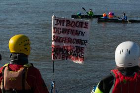 Protesters Paddle For Diversity In Cologne