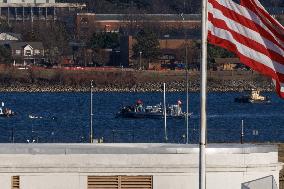 Crews Search At The Wreckage Site - Potomac River