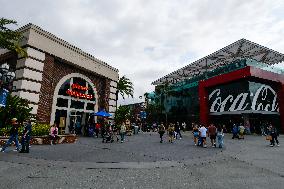 Visitors At Disney Springs In Florida