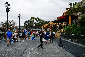 Visitors At Disney Springs In Florida