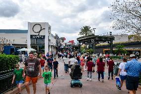 Visitors At Disney Springs In Florida