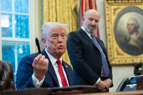 President Donald J Trump signs executive orders