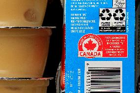 Consumer Grocery Products With Various Labels Showing Country Of Origin.