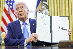 US President Trump Signs Executive Orders in the Oval Office of the White House