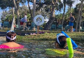 People Seek Health Benefits At Warm Mineral Springs Park  In Florida