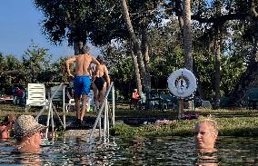 People Seek Health Benefits At Warm Mineral Springs Park  In Florida