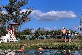 People Seek Health Benefits At Warm Mineral Springs Park  In Florida