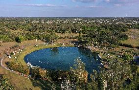 People Seek Health Benefits At Warm Mineral Springs Park  In Florida