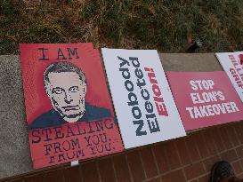 Protesters Gathers At The Consumer Financial Protection Bureau Headquarters To Protest Against Elon Musk And President Donald Tr