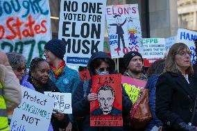 Protesters Gathers At The Consumer Financial Protection Bureau Headquarters To Protest Against Elon Musk And President Donald Tr