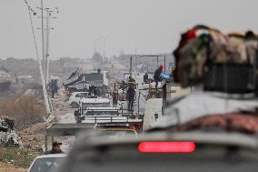 Displaced Palestinians Cross the Netzarim Corridor - Gaza