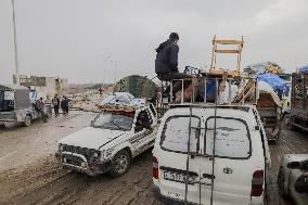 Displaced Palestinians Cross the Netzarim Corridor - Gaza