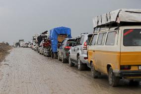 Displaced Palestinians Cross the Netzarim Corridor - Gaza