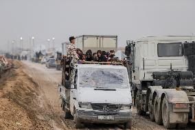Displaced Palestinians Cross the Netzarim Corridor - Gaza