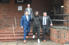 Suspect 23-year-old Christian Millet Is Walked Out Of The 7th Precinct After Being Charged With The Murder Of 65-year-old Edwin