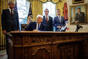 DC: U.S. President Trump Signs Executive Orders in the Oval Office