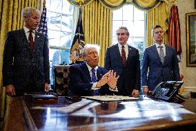 DC: U.S. President Trump Signs Executive Orders in the Oval Office