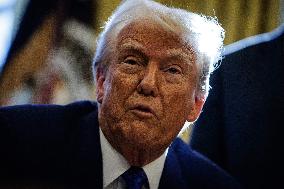 DC: U.S. President Trump Signs Executive Orders in the Oval Office