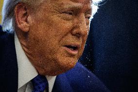 DC: U.S. President Trump Signs Executive Orders in the Oval Office