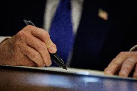 DC: U.S. President Trump Signs Executive Orders in the Oval Office
