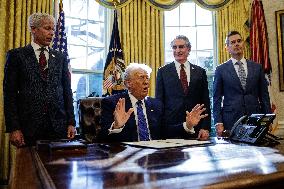 DC: U.S. President Trump Signs Executive Orders in the Oval Office