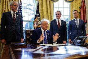 DC: U.S. President Trump Signs Executive Orders in the Oval Office
