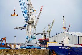 Freight Cranes In The Port Of Hamburg