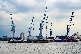 Freight Cranes In The Port Of Hamburg