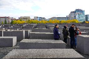 Tourists Visit The Holocaust Memorial Berlin