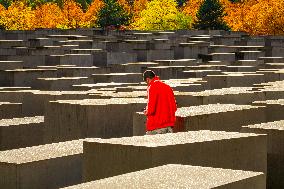 Tourists Visit The Holocaust Memorial Berlin