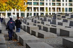 Tourists Visit The Holocaust Memorial Berlin