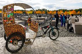 Tourists Visit The Holocaust Memorial Berlin