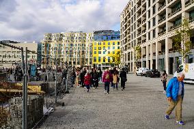 Tourists Visit The Holocaust Memorial Berlin