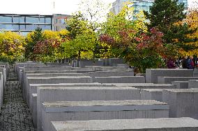 Tourists Visit The Holocaust Memorial Berlin